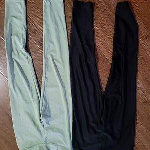 Light green and black butt lifting leggings.
